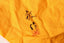 Original yellow wrapping cloth accompanying the Katō Keiya vase, with black calligraphy and a red seal